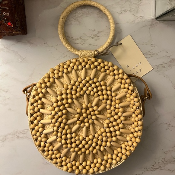 a new day Handbags - Beaded basket weave bag
